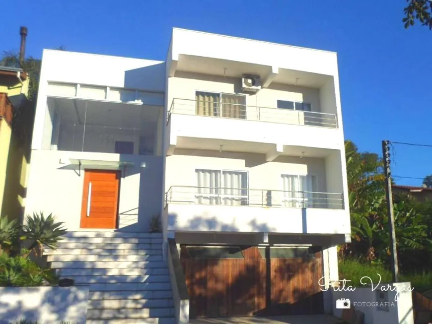 Foto 1 de Casa de Condomínio com 3 Quartos à venda, 297m² em Condominio Cantegril, Viamão