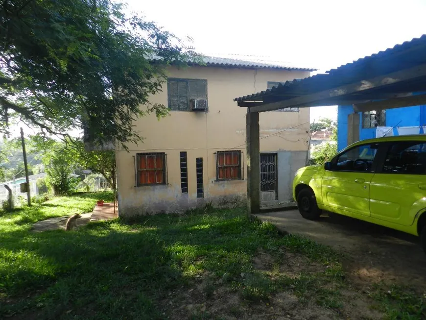 Foto 1 de Casa com 4 Quartos à venda, 53m² em Tarumã, Viamão