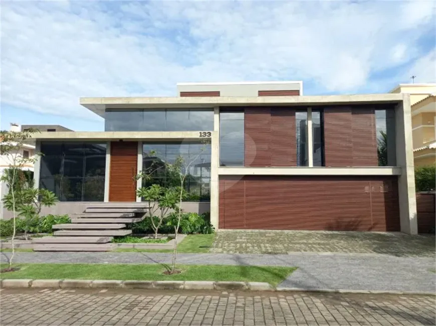 Foto 1 de Casa com 4 Quartos à venda, 474m² em Jurerê Internacional, Florianópolis