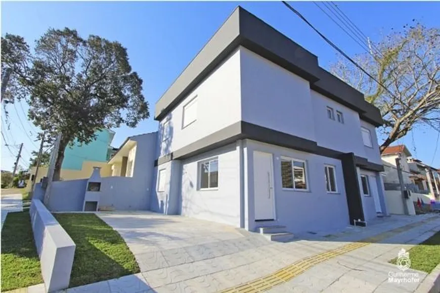 Foto 1 de Casa com 3 Quartos à venda, 101m² em Guarujá, Porto Alegre