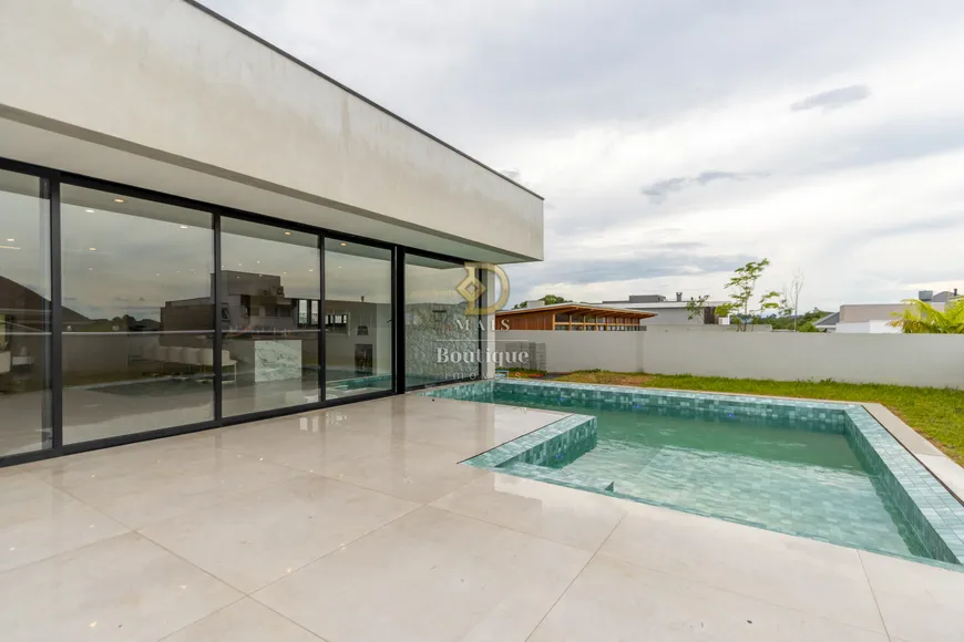 Foto 1 de Casa de Condomínio com 4 Quartos à venda, 423m² em Riviera, Curitiba