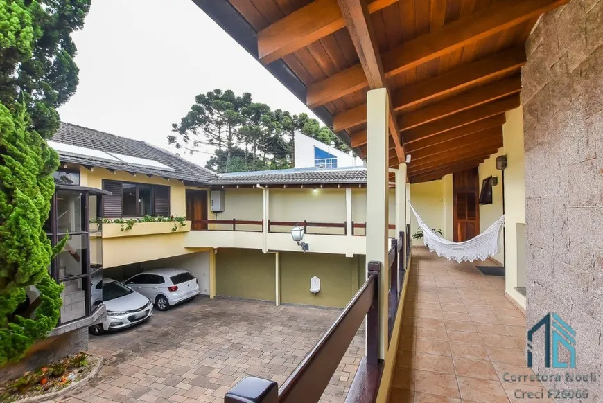 Foto 1 de Casa com 5 Quartos à venda, 480m² em Ahú, Curitiba