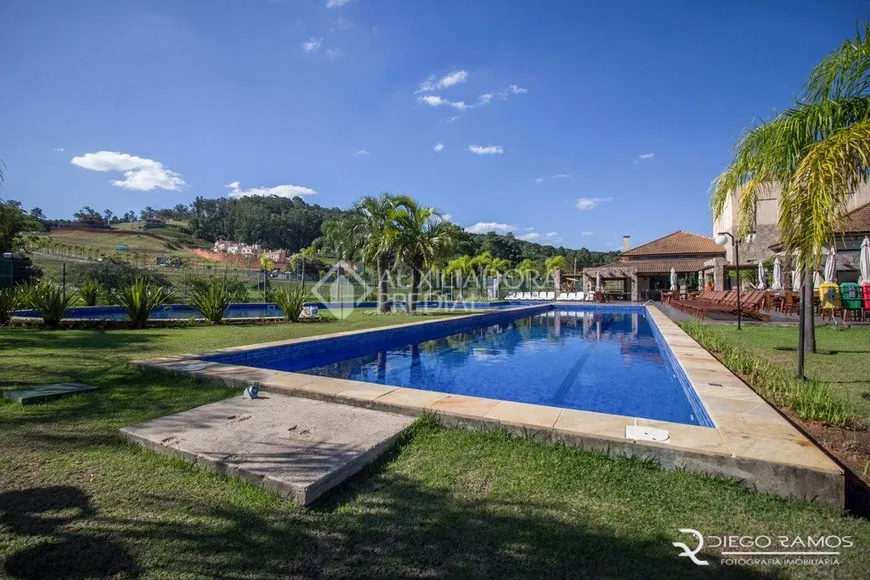 Foto 1 de Casa de Condomínio com 3 Quartos para alugar, 350m² em Vila Nova, Porto Alegre