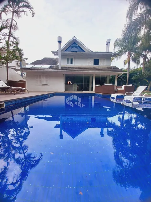 Foto 1 de Casa de Condomínio com 4 Quartos à venda, 380m² em Praia Mole, Florianópolis