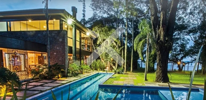 Foto 1 de Casa de Condomínio com 4 Quartos para venda ou aluguel, 552m² em Ipanema, Porto Alegre