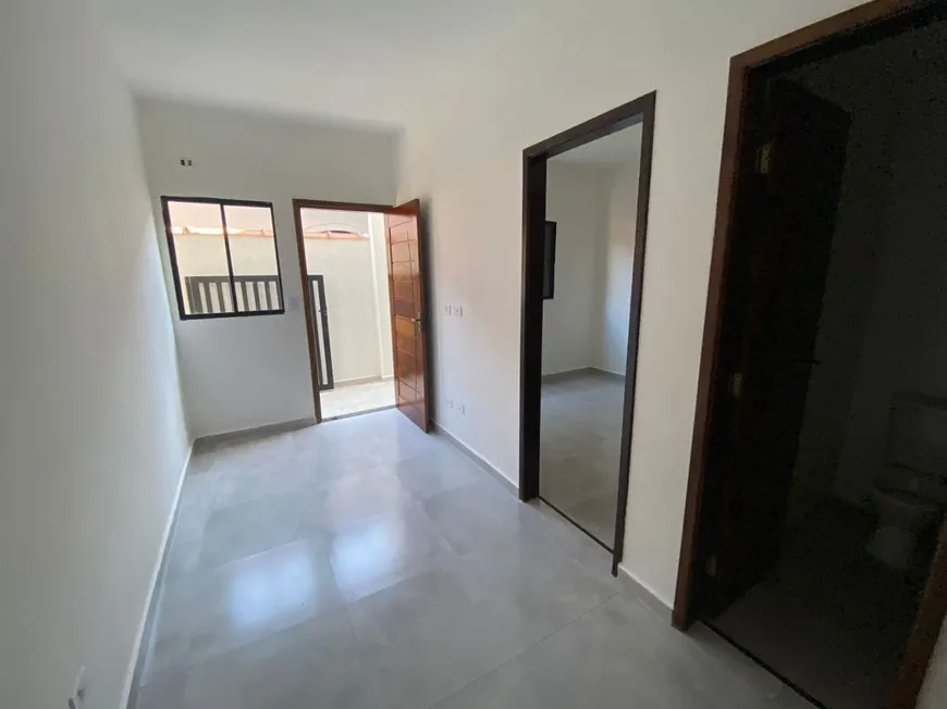 Foto 1 de Casa de Condomínio com 2 Quartos à venda, 71m² em Mirim, Praia Grande