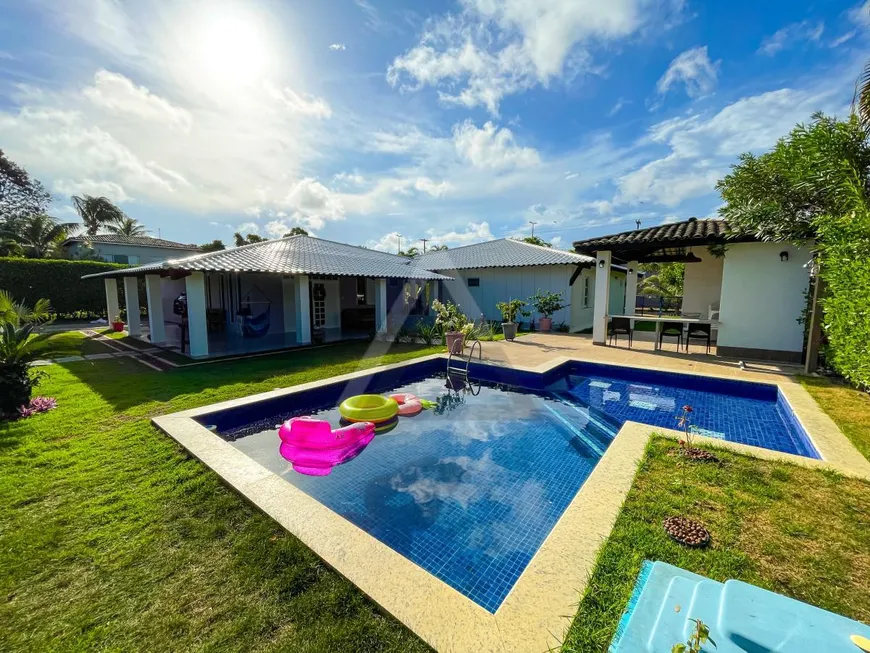 Foto 1 de Casa de Condomínio com 6 Quartos à venda, 374m² em Estrada do Coco, Lauro de Freitas