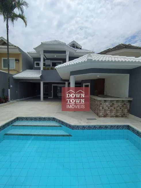 Foto 1 de Casa de Condomínio com 4 Quartos à venda, 270m² em Barra da Tijuca, Rio de Janeiro