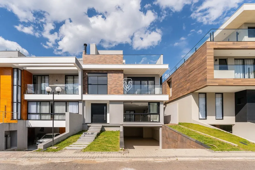 Foto 1 de Casa de Condomínio com 4 Quartos à venda, 380m² em Campo Comprido, Curitiba
