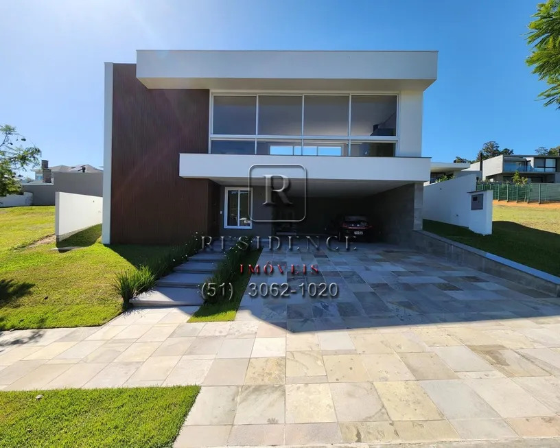 Foto 1 de Casa de Condomínio com 3 Quartos à venda, 250m² em Vila Nova, Porto Alegre