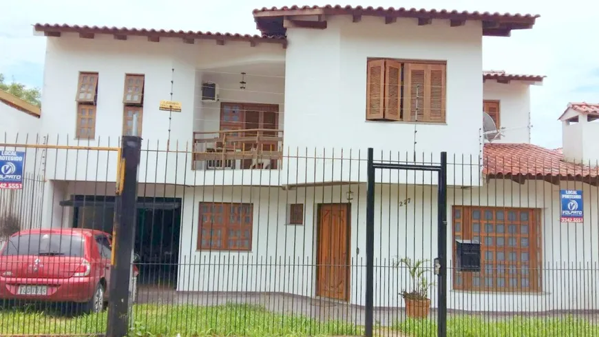 Foto 1 de Casa de Condomínio com 4 Quartos à venda, 430m² em Nonoai, Porto Alegre