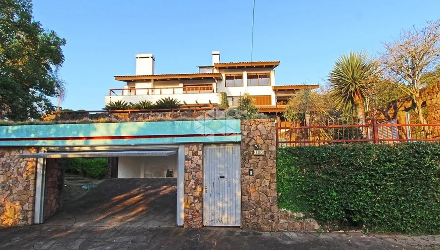Foto 1 de Casa com 4 Quartos à venda, 600m² em Teresópolis, Porto Alegre