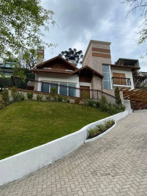 Foto 1 de Casa de Condomínio com 4 Quartos à venda, 300m² em Centro, Gramado