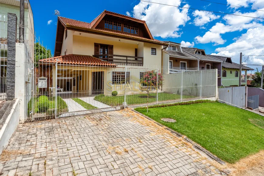 Foto 1 de Sobrado com 4 Quartos à venda, 245m² em Pilarzinho, Curitiba