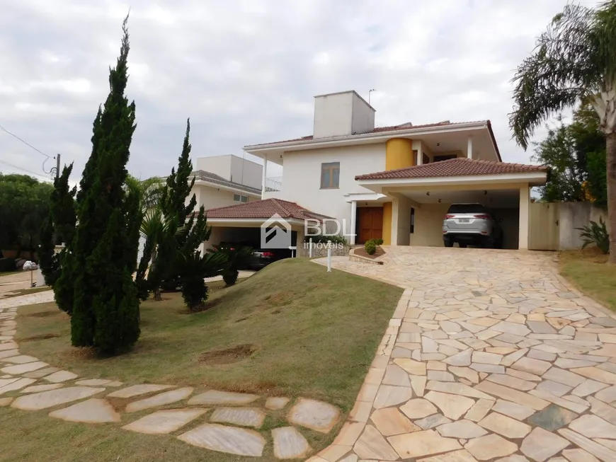 Foto 1 de Casa de Condomínio com 5 Quartos para venda ou aluguel, 700m² em Loteamento Alphaville Campinas, Campinas