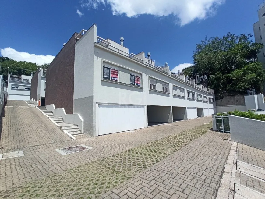Foto 1 de Casa de Condomínio com 3 Quartos para alugar, 273m² em Praia de Belas, Porto Alegre