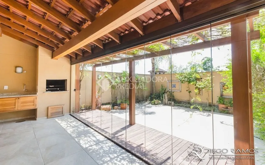 Foto 1 de Casa de Condomínio com 3 Quartos à venda, 437m² em Três Figueiras, Porto Alegre