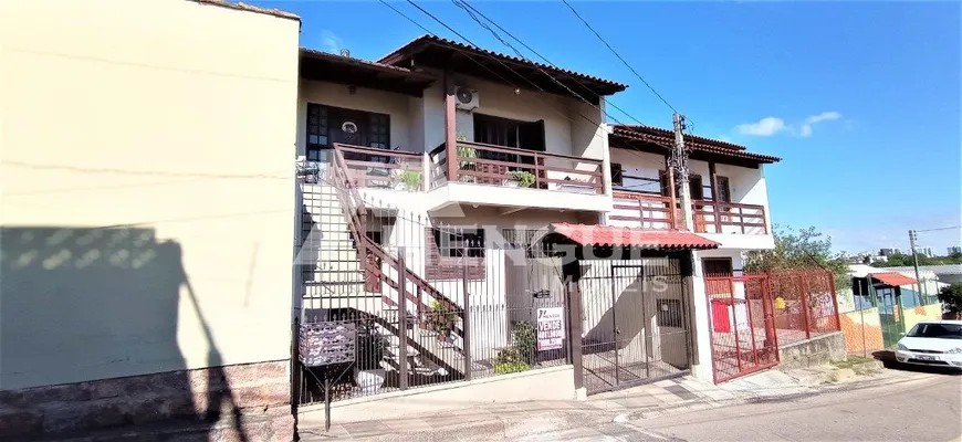 Foto 1 de Casa com 5 Quartos à venda, 245m² em Jardim Itú Sabará, Porto Alegre