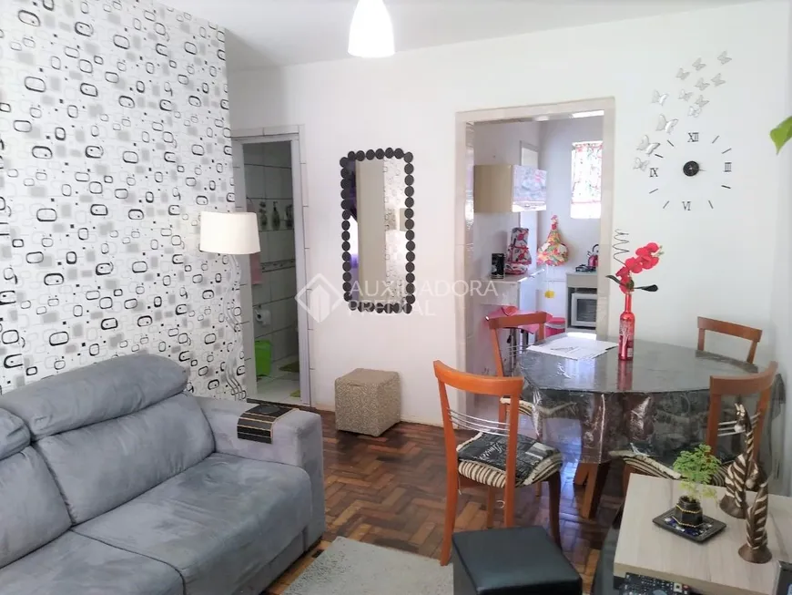 Foto 1 de Apartamento com 2 Quartos à venda, 56m² em Humaitá, Porto Alegre