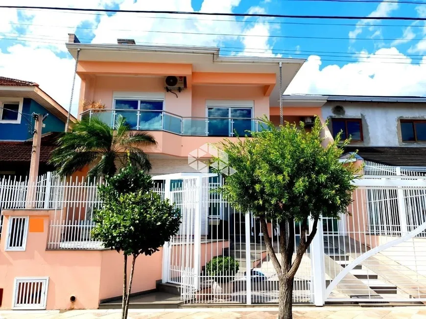 Foto 1 de Casa de Condomínio com 4 Quartos à venda, 250m² em Alto Petrópolis, Porto Alegre