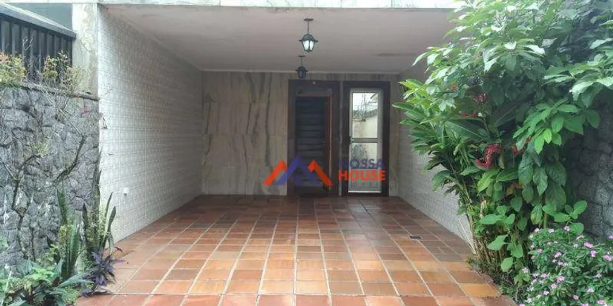 Foto 1 de Casa com 4 Quartos à venda, 200m² em Boqueirão, Santos