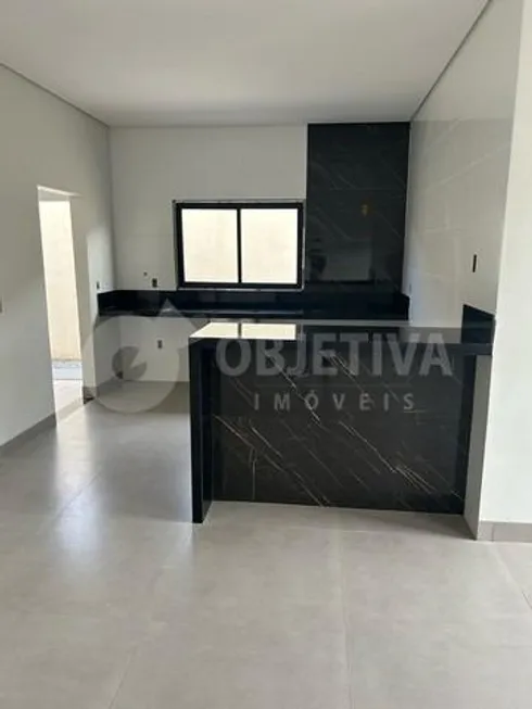 Foto 1 de Casa com 3 Quartos à venda, 114m² em Novo Mundo, Uberlândia