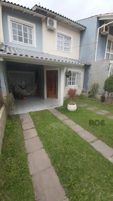 Foto 1 de Casa com 3 Quartos à venda, 103m² em Hípica, Porto Alegre