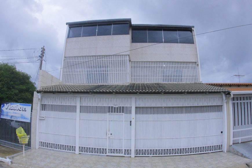Foto 1 de Sobrado com 4 Quartos à venda, 495m² em Taguatinga Norte, Brasília