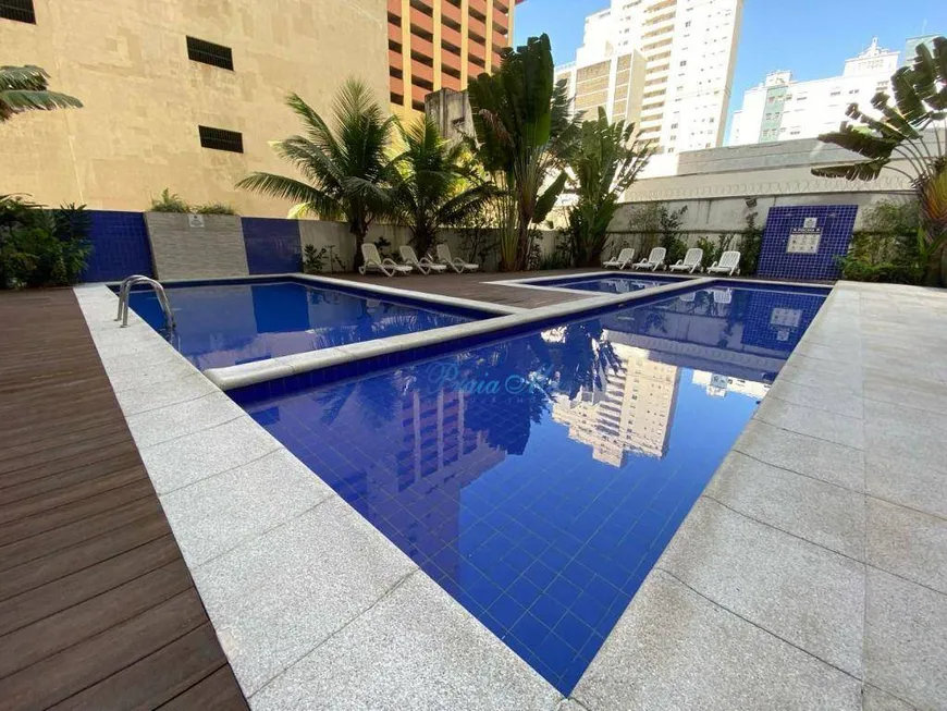 Foto 1 de Flat com 2 Quartos à venda, 65m² em Praia das Pitangueiras, Guarujá