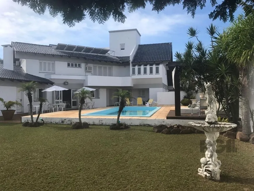 Foto 1 de Casa com 4 Quartos à venda, 497m² em Girassol, Capão da Canoa