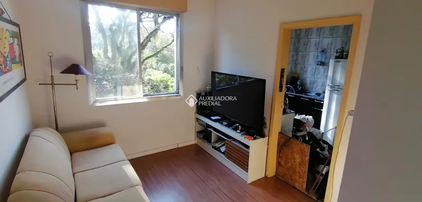 Foto 1 de Apartamento com 1 Quarto à venda, 38m² em Santo Antônio, Porto Alegre