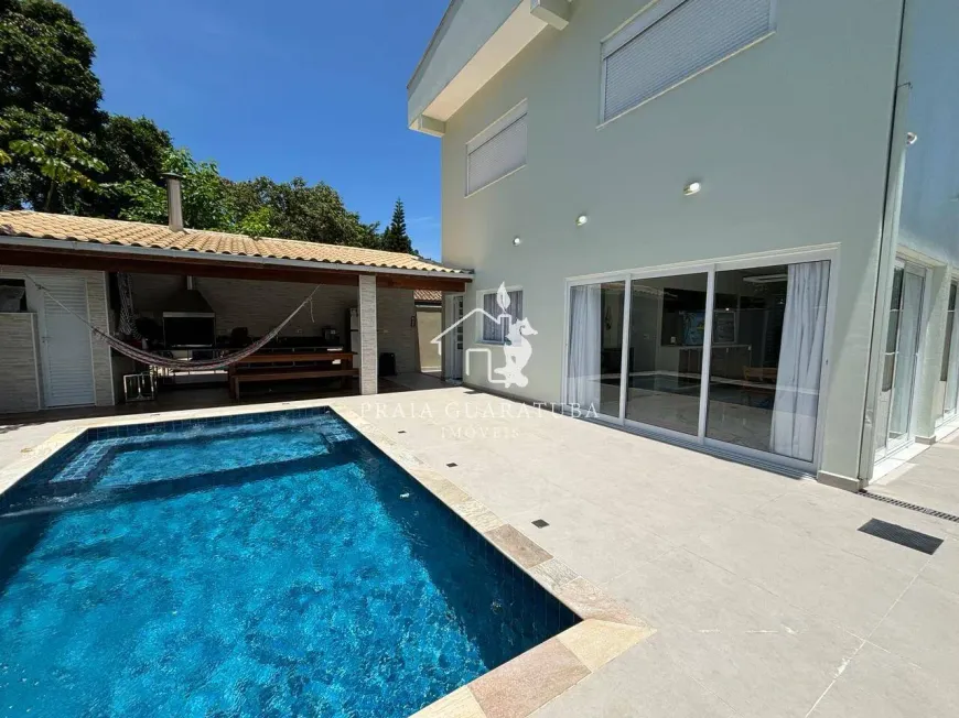 Foto 1 de Casa de Condomínio com 4 Quartos à venda, 210m² em Loteamento Costa do Sol, Bertioga
