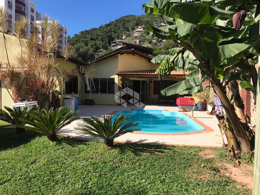 Foto 1 de Casa com 4 Quartos à venda, 220m² em Saco Grande, Florianópolis
