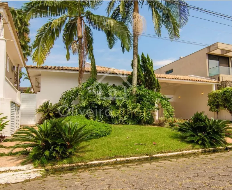 Foto 1 de Casa de Condomínio com 4 Quartos à venda, 420m² em Jardim Acapulco , Guarujá