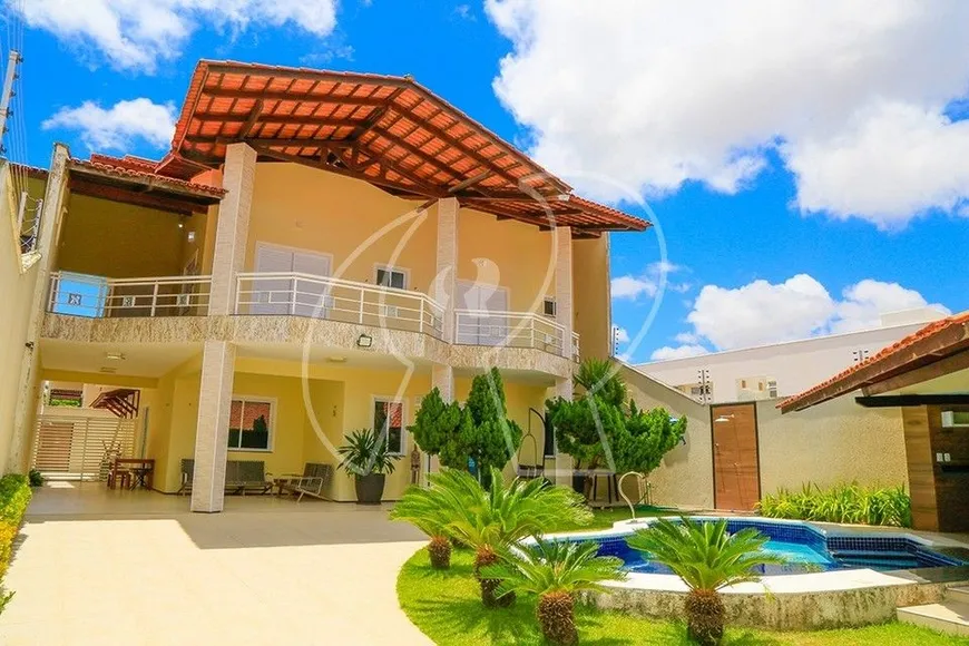 Foto 1 de Casa com 5 Quartos à venda, 239m² em Engenheiro Luciano Cavalcante, Fortaleza