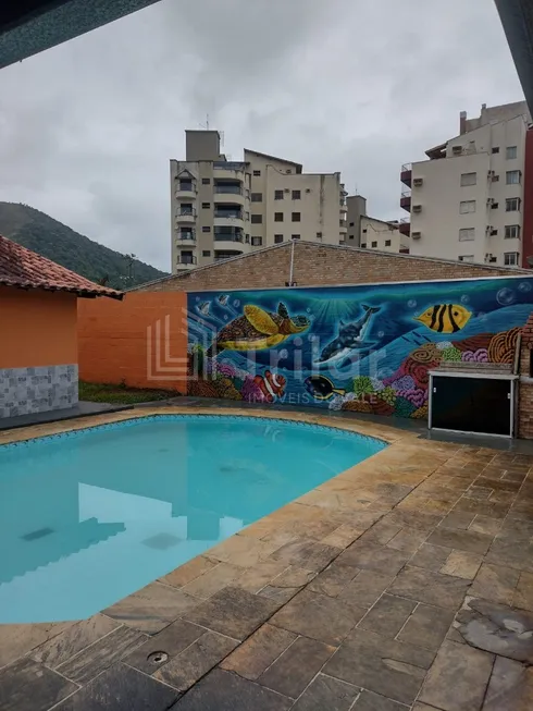 Foto 1 de Casa com 3 Quartos à venda, 200m² em Martim de Sa, Caraguatatuba