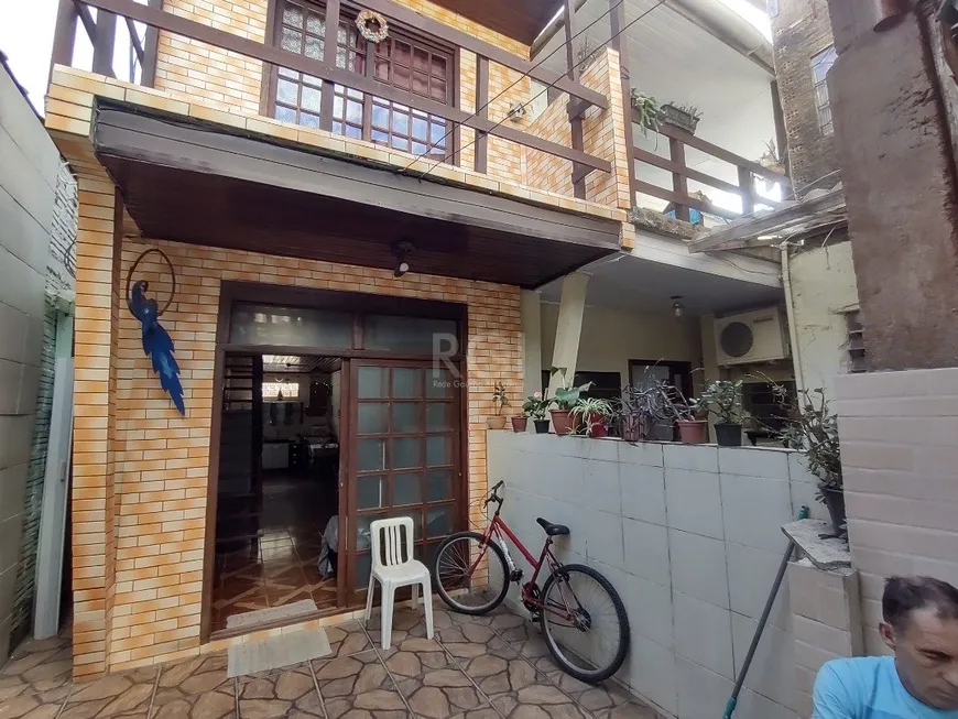 Foto 1 de Casa com 6 Quartos à venda, 399m² em Cavalhada, Porto Alegre