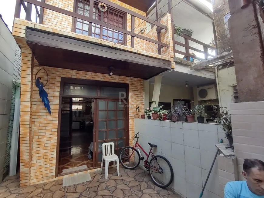 Foto 1 de Casa com 6 Quartos à venda, 401m² em Cavalhada, Porto Alegre