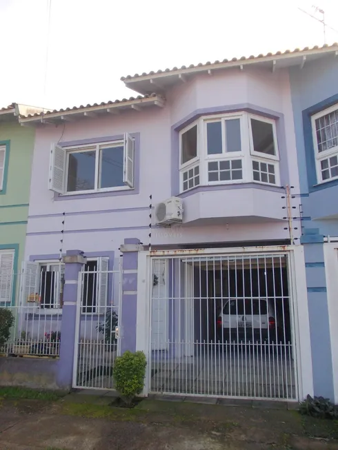 Foto 1 de Casa com 3 Quartos à venda, 148m² em Santa Fé, Porto Alegre