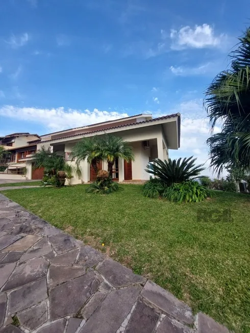 Foto 1 de Casa de Condomínio com 3 Quartos à venda, 450m² em Nonoai, Porto Alegre