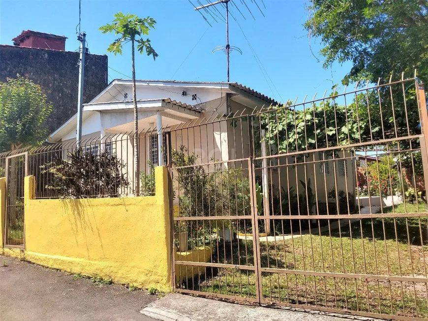 Foto 1 de Casa com 2 Quartos à venda, 80m² em Vila Nova, Porto Alegre