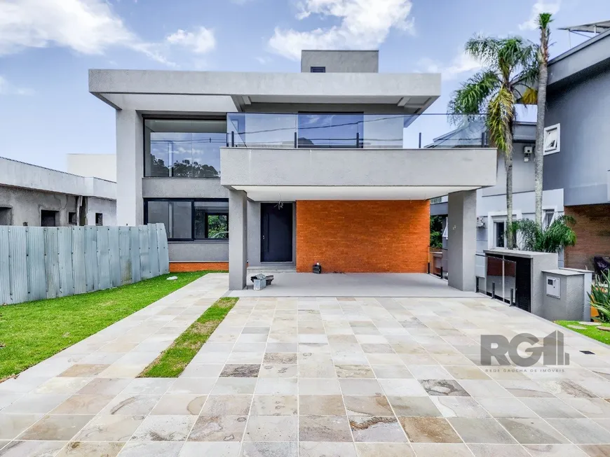 Foto 1 de Casa de Condomínio com 3 Quartos à venda, 350m² em Alphaville, Porto Alegre