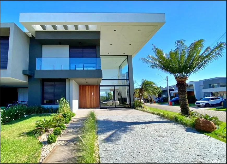 Foto 1 de Casa de Condomínio com 4 Quartos para venda ou aluguel, 250m² em Xangri la, Xangri-lá