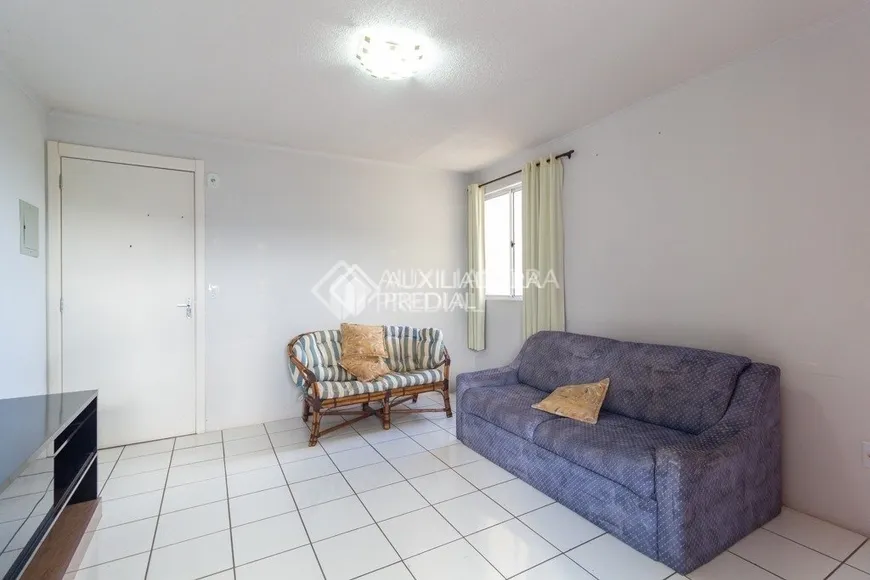 Foto 1 de Apartamento com 2 Quartos à venda, 43m² em Vila Nova, Porto Alegre