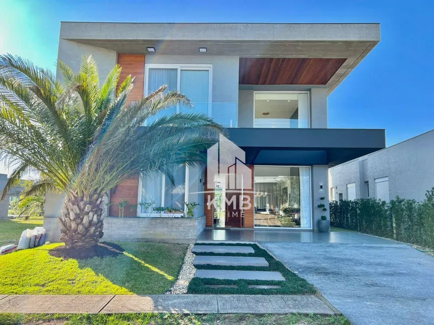 Foto 1 de Casa de Condomínio com 4 Quartos à venda, 270m² em Capao da Canoa, Capão da Canoa