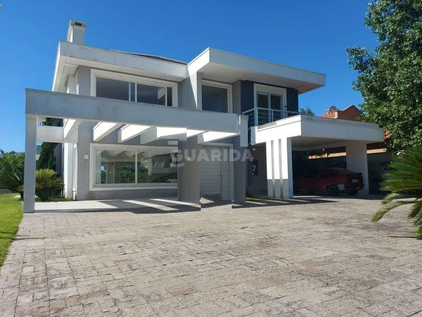 Foto 1 de Casa de Condomínio com 4 Quartos para alugar, 500m² em Belém Novo, Porto Alegre