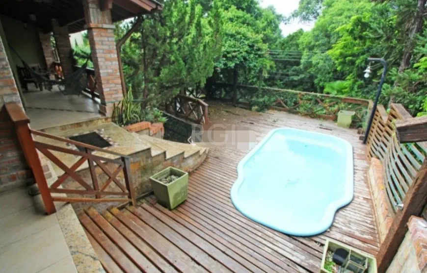 Foto 1 de Casa com 4 Quartos à venda, 419m² em São Lucas, Viamão