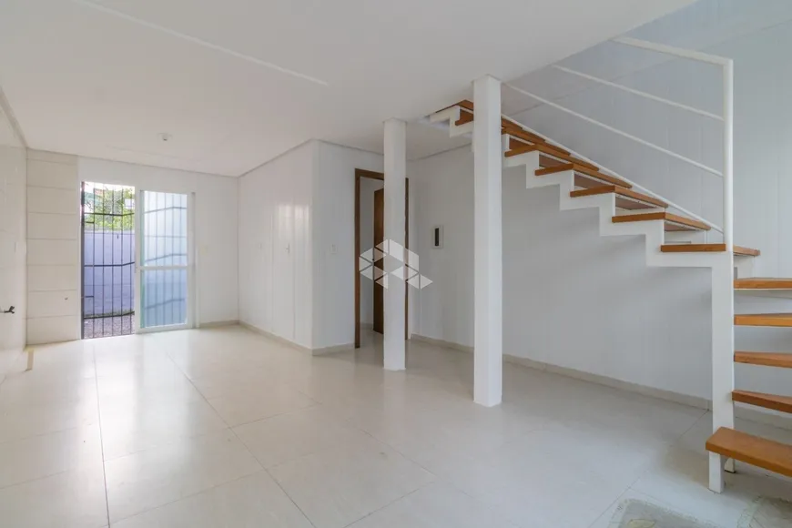 Foto 1 de Casa com 2 Quartos à venda, 59m² em Tarumã, Viamão