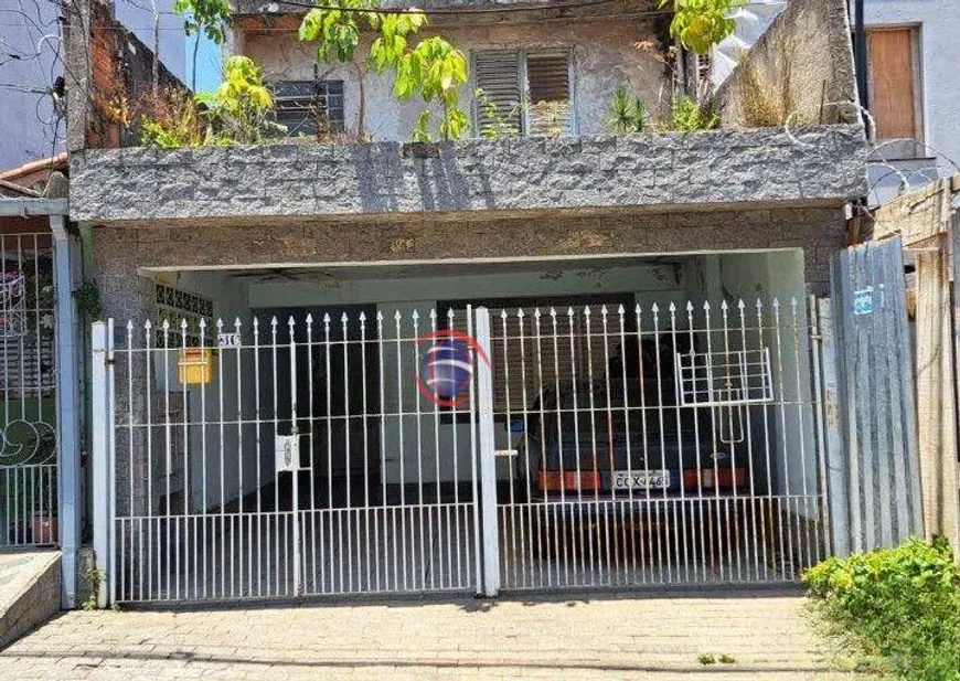 Foto 1 de Casa com 4 Quartos à venda, 164m² em Vila Scarpelli, Santo André