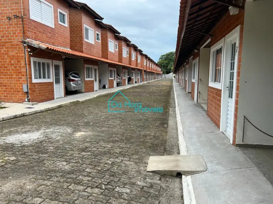 Foto 1 de Casa de Condomínio com 3 Quartos à venda, 97m² em Centro, Mongaguá